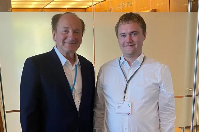 Philipp Krug mit dem Nobelpreisträger Robert C. Merton